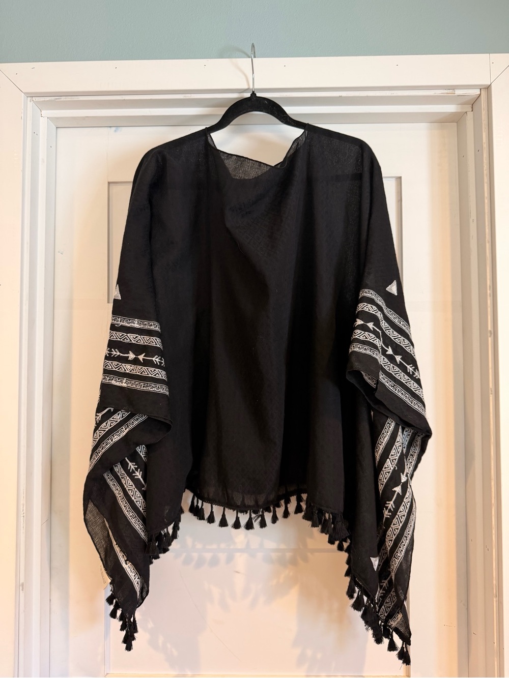 Three Bird Nest Black Poncho with White Geometric Trim